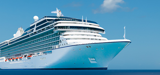 A large cruise ship sailing through the ocean